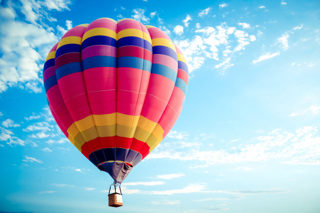 colorful-hot-air-balloon-flying-on-sky_1484-1095.jpg
