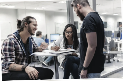 Colleagues in conversation at work